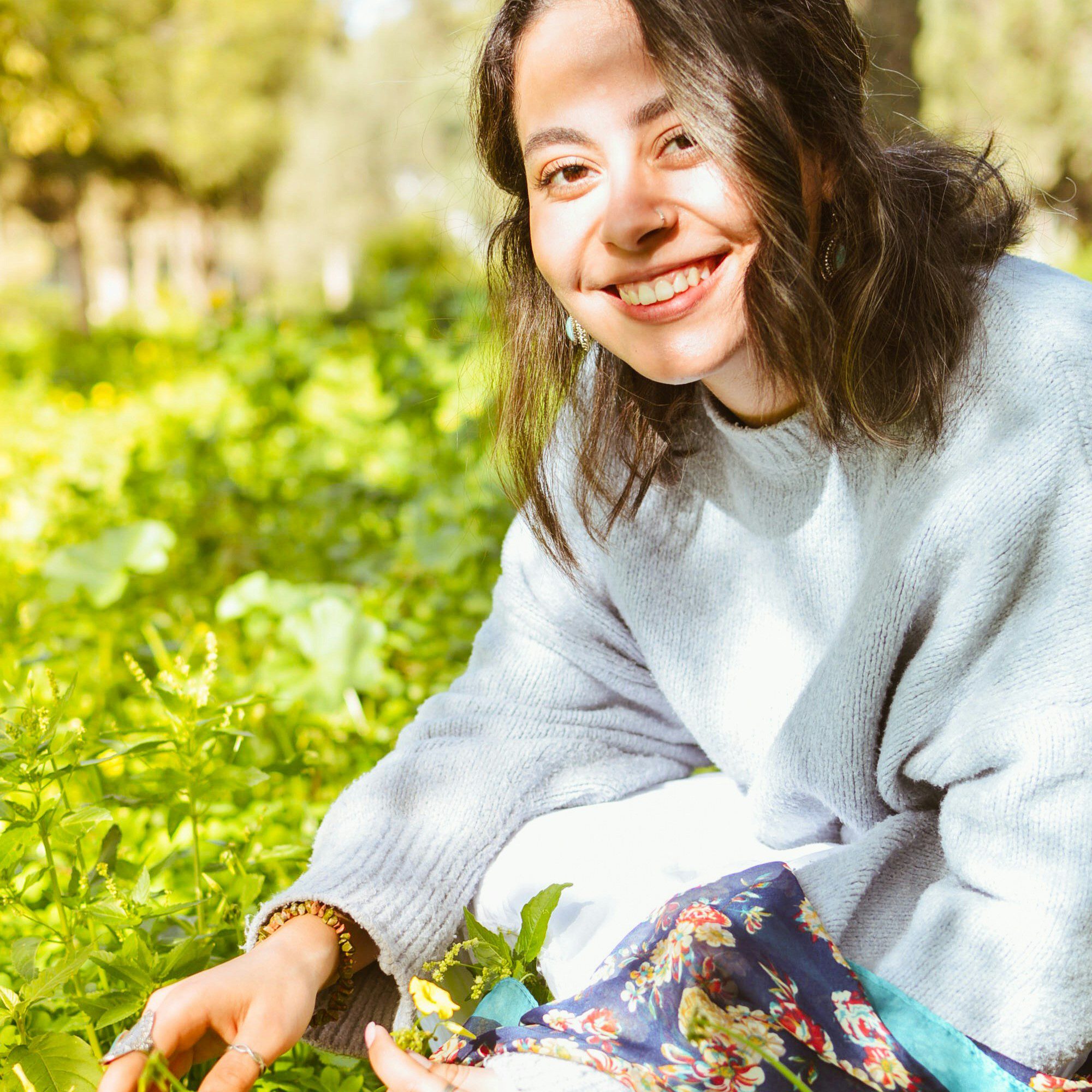 Emma Reynolds smiling in the Gardens