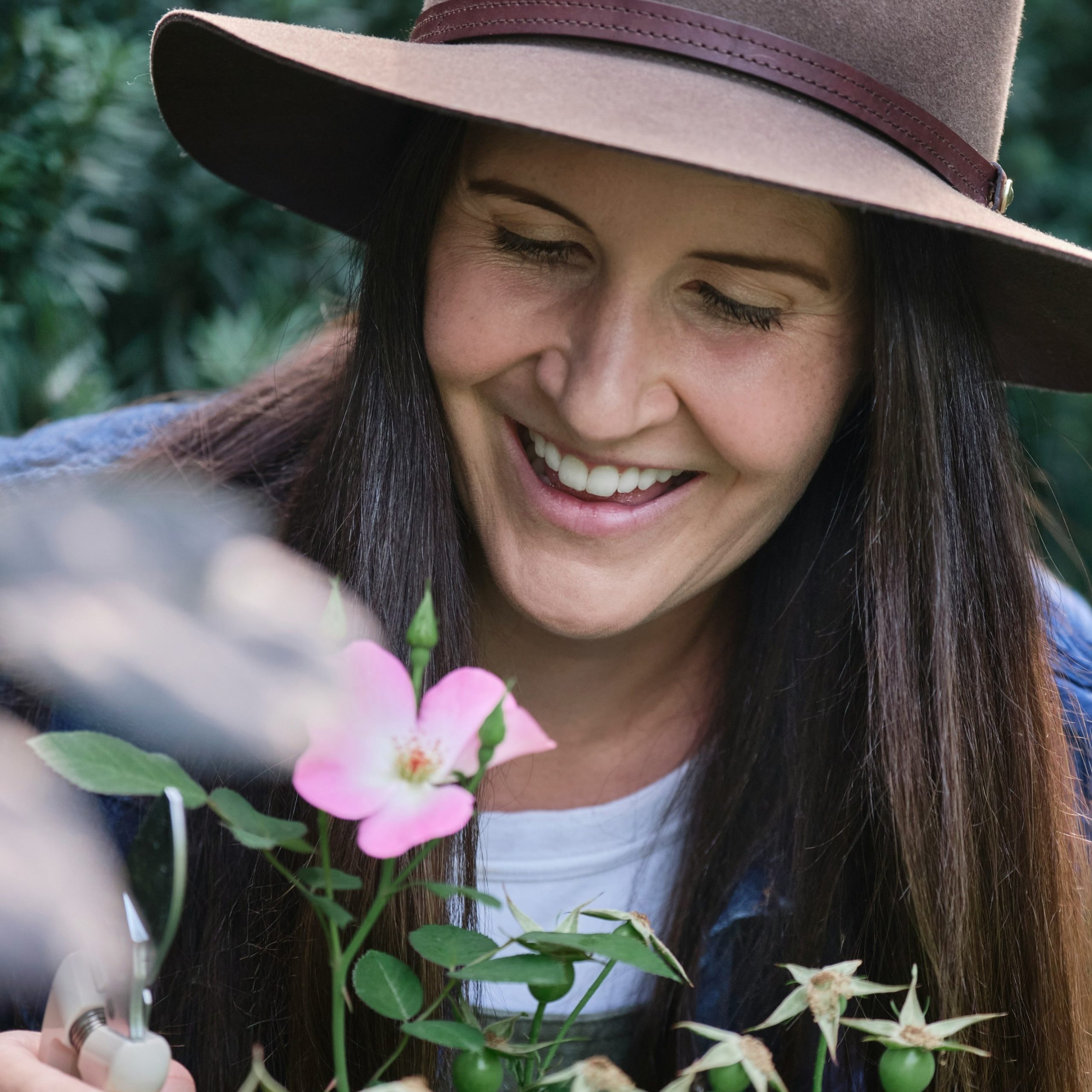 Sophie Patterson tending to flowers as a volunteer
